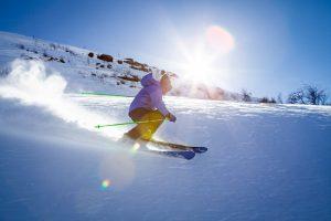 A man skiing on the mountain. 